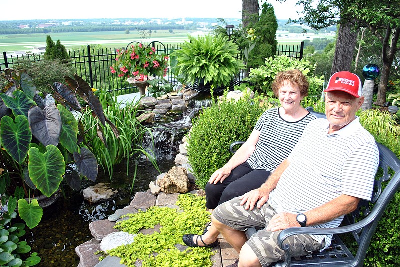 <p>Samantha Pogue/News Tribune</p><p>Alice and Floyd Hansen’s hilltop Holts Summit home garden has a mesmerizing view of Jefferson City as well as lavish garden highlights including a water garden with waterfall. These features and others helped the couple earn the Bittersweet Garden Club’s August Garden of the Month.</p>