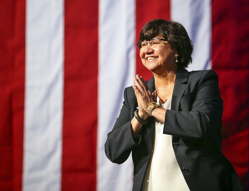 In this June 22, 2018 file photo, gubernatorial candidate Lupe Valdez is greeted as she takes the stage during the general session at the Texas Democratic Convention in Fort Worth, Texas. Dallas County authorities say a new inventory search has turned up former sheriff Lupe Valdez's gun that was reported missing after she stepped down to run for Texas governor. The Dallas County sheriff's department on Tuesday, Aug. 21, 2018, apologized to Valdez for "any distress and hardship" after the Democratic nominee for governor faced questions surrounding the whereabouts of her on-duty weapon. (AP Photo/Richard W. Rodriguez, File)
