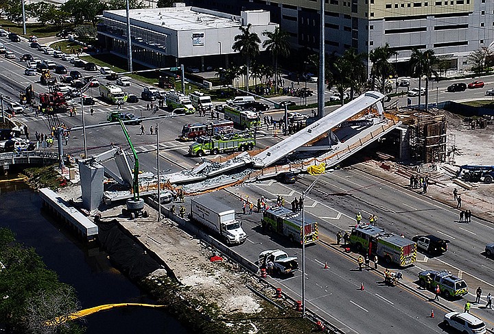 View of  the main span of the FIU-Sweetwater UniversityCity Bridge after collapsing five days after been installed over SW 8 Street-State Road 41 in Miami on March 15, 2018. (Pedro Portal/Miami Herald/TNS)