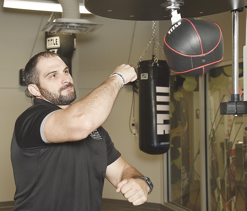 Punching away Parkinson's tremors Jefferson City News Tribune