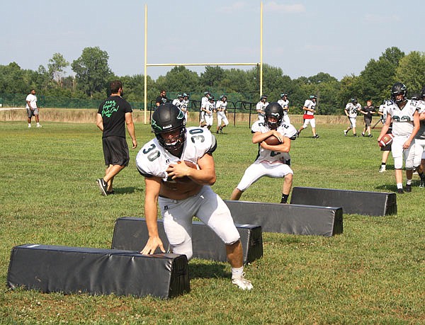 North Callaway running backs focus on their footwork during a drill at a recent practice at the high school in Kingdom City. The Thunderbirds — coming off a Class 2 quarterfinal appearance — kick off the 2018 season at home tonight against Missouri Military Academy.