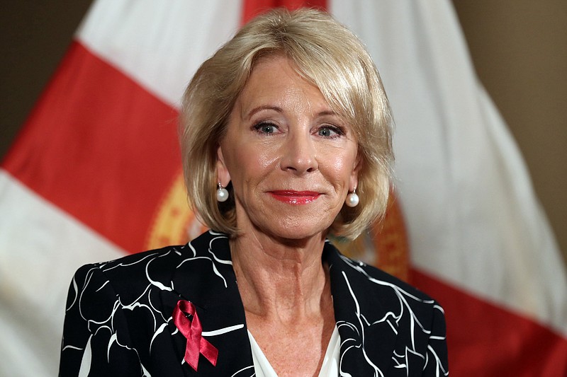 U.S. Secretary of Education Betsy Devos speaks during a news conference at the Marriot Heron Bay in Coral Springs, Fla., after meeting with students at Marjory Stoneman Douglas High School in Parkland on Wednesday, March 7, 2018. A Trump administration proposal to repeal Obama-era requirements for recipients of federal student aid reportedly comes with a price tag of about $5.3 billion over a decade. (Amy Beth Bennett/Sun Sentinel/TNS) 