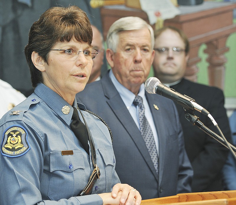 Col. Sandra Karsten, at left, superintendent of the Missouri State Highway Patrol, whose retirement from that agency was announced the previous week, was named the director of the Department of Public Safety during a morning news conference Monday, Aug. 27, 2018, in Gov. Mike Parson's Capitol office.