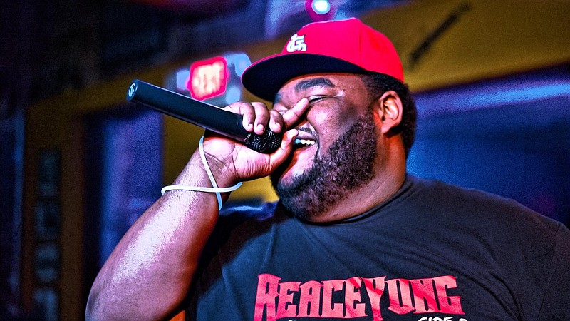 <p>Courtesy of REACEYUNG</p><p>REACEYUNG performs during a recent gig. His latest album, “Unlucky Me,” hit the Billboard Heatseekers chart for new music at No. 2, making him the second independent Mid-Missouri hip-hop artist to reach this achievement.</p>
