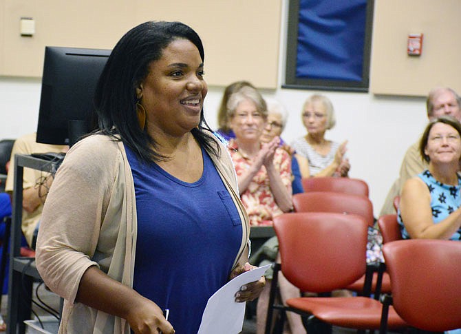 Nicole Porter of The Sentencing Project is introduced as the speaker Wednesday at Lincoln University's Page Library. 