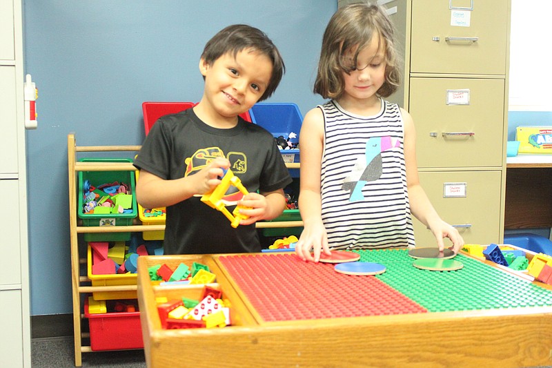 Pedro Ojeda and Kelsey Kimball construct a masterpiece Aug. 30, 2018, as their day in Mrs. Scheidt's preschool class comes to a close.