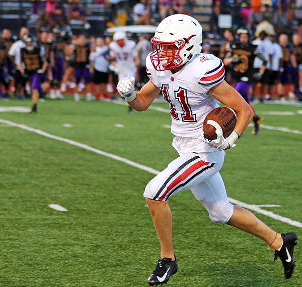 Jays receiver Levi Jobe sprints toward the end zone for a touchdown during Jamboree earlier this month at Hickman in Columbia.