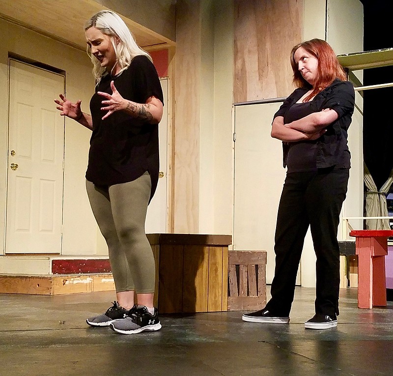Anna Edwards, left, and Wendi Evetts rehearse their lead roles for the Texarkana Repertory Company's production of "The Odd Couple."