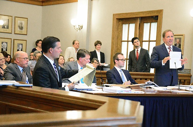 Judge Dan Green hears two cases Friday, both challenging the Clean Missouri amendment to the state's Constitution, from attorneys, from left, Lowell Pearson, Eddie Greim, Marc Ellinger, Jason Lewis and Chuck Hatfield.