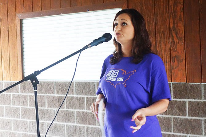 Debbie Berry of Ashland talks about losing her son to an opioid addiction. She was one of several speakers at the FED UP! Rally Friday at Memorial Park.