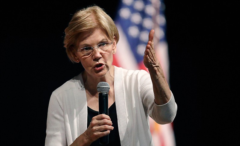 U.S. Sen. Elizabeth Warren, D-Mass., gestures Aug. 8, 2018, during a town hall-style gathering in Woburn, Mass. 