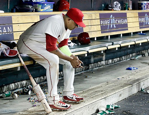 Yairo Munoz sits in the Cardinals dugout following Saturday night's 4-3 loss to the Tigers in Detroit.