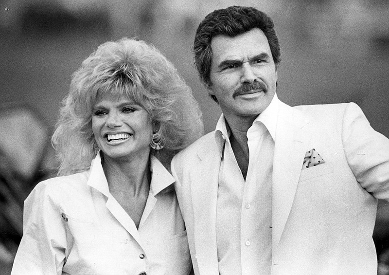 In this March 15, 1987 photo, Burt Reynolds and Loni Anderson appear at a polo match in Boca Raton, Fla. Reynolds, who starred in films including "Deliverance," "Boogie Nights," and the "Smokey and the Bandit" films, died at age 82, according to his agent. (Anne Ryan/South Florida Sun-Sentinel via AP)
