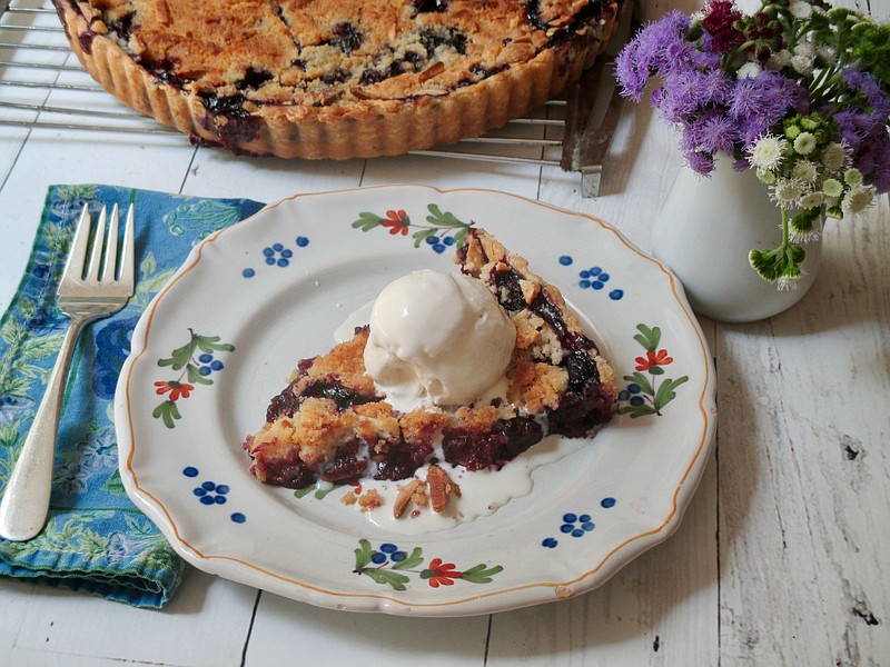 This Aug. 10, 2018 photo shows a blueberry struesel tart in New York. This dish is from a recipe by Sara Moulton. (Sara Moulton via AP)