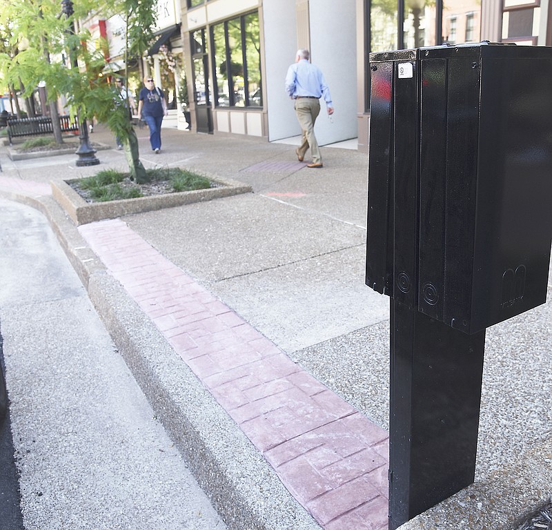 Sam Gaines Construction continues work on High Street to install electrical boxes, like the one shown on the right. 