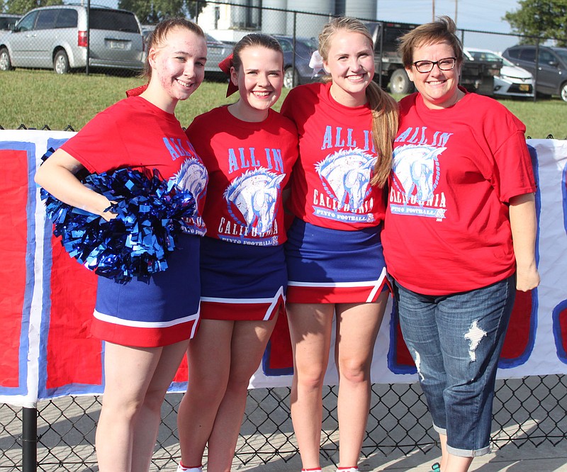 Three members of the California High School cheer team are getting ready to spend Thanksgiving in Philadelphia, Pennsylvania, to perform for the 99th Annual Thanksgiving Day Parade. Pictured, from left, are Ashlee Thomas, Molly Forsythe, Alyssa Sabartinelli and Coach Annette Forsythe.