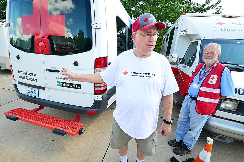 Bill Grier, left, and Thomas Hafer of the American Red Cross of Missouri and Arkansas prepare to deploy Tuesday to Virginia and then to the Carolinas to support local agencies affected by Hurricane Florence.