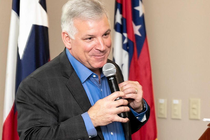 Astronaut Col. Greg Johnson speaks to the audience at the Exploring Impact luncheon on Tuesday at the Christus St. Michael North conference center in Texarkana, Texas.