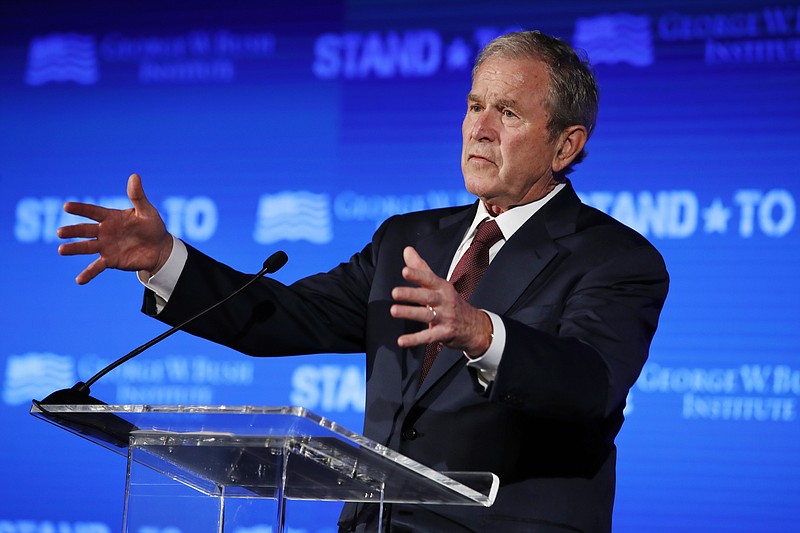In this June 23, 2017 file photo, former President George W. Bush speaks during "Stand-To," a summit held by the George W. Bush Institute focused on veteran transition, in Washington. Bush will be in Florida on Friday to fundraise for Gov. Rick Scott's bid to oust Democratic Sen. Bill Nelson in a closely watched and expensive campaign. (AP Photo/Jacquelyn Martin)