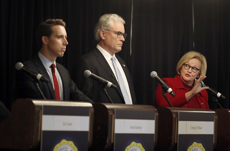Incumbent Democratic Sen. Claire McCaskill, right, speaks alongside Independent candidate Craig O'Dear, center, and Republican U.S. Senate candidate Josh Hawley, left, during a candidate forum at the annual Missouri Press Association convention Friday, Sept. 14, 2018, in Maryland Heights, Mo. (AP Photo/Jeff Roberson)
