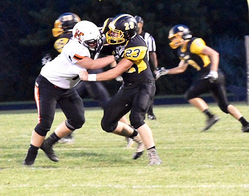 Fulton junior defensive lineman Cody Settles locks up with a Kirksville offensive lineman during the Hornets' 42-19 loss to the Tigers in last Friday's North Central Missouri Conference opener at Robert E. Fisher Jr. Stadium in Fulton.