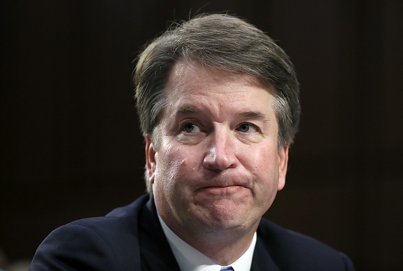 In this Sept. 6, 2018 photo, Supreme Court nominee Brett Kavanaugh reacts as he testifies after questioning before the Senate Judiciary Committee on Capitol Hill in Washington. Official Washington is scrambling Monday to assess and manage Kavanaugh’s prospects after his accuser, Christine Blasey Ford, revealed her identity to The Washington Post and described an encounter she believes was attempted rape. Kavanaugh reported to the White House amid the upheaval, but there was no immediate word on why or whether he had been summoned.  (AP Photo/Alex Brandon)