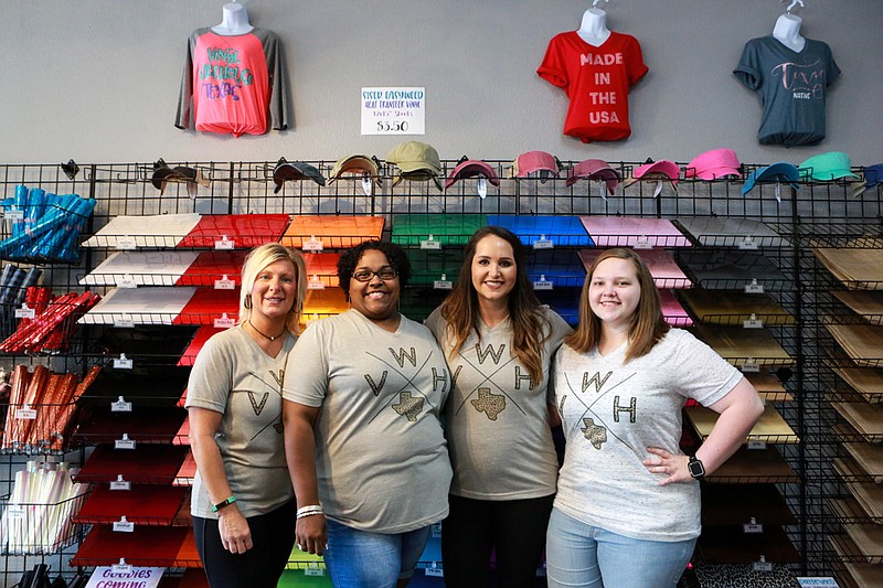 Tina Anderson, Shenna Thomas, Kali Bannon and Blair Dillahunty pose for a photo Friday at Vinyl Warehouse in Texarkana, Texas. 
