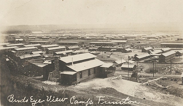 Pictured in the real-photo postcard is one of the cantonment areas located on Camp Funston during World War I, similar to where Frank J. Schulte would have trained. The camp, although decommissioned in 1924, was located on what is now Fort Riley.