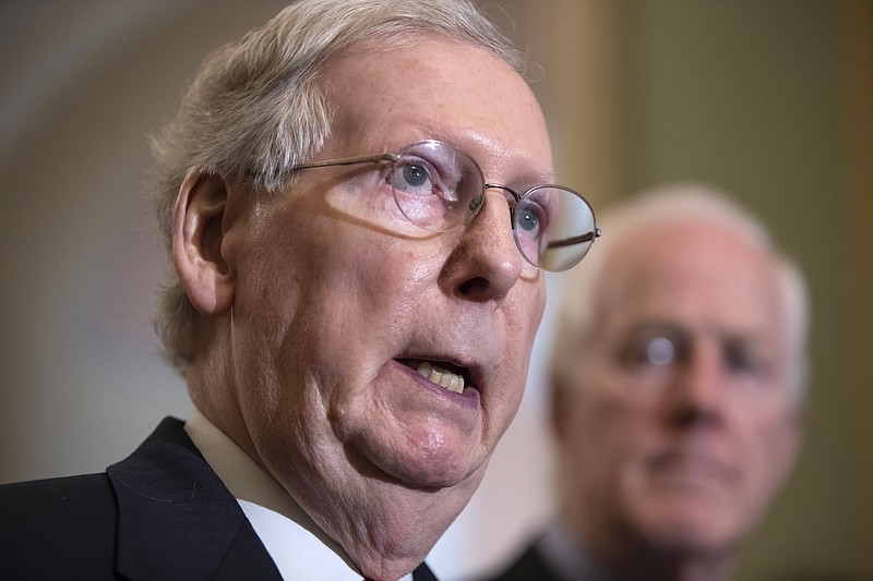 Senate Majority Leader Mitch McConnell, R-Ky., joined at right by Majority Whip John Cornyn, R-Texas, speaks with reporters about Supreme Court nominee Brett Kavanaugh following their weekly policy meetings, at the Capitol in Washington, Tuesday, Sept. 18, 2018. (AP Photo/J. Scott Applewhite)