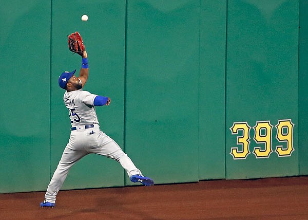 Royals center fielder Brian Goodwin leaps to make the catch on a fly ball hit to deep center field by Kevin Kramer of the Pirates during the seventh inning of Monday night's game in Pittsburgh.