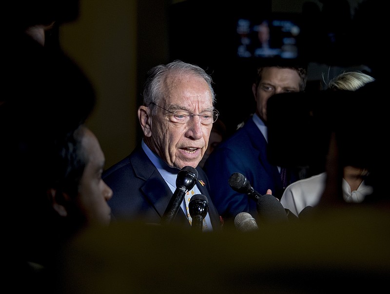 Senate Judiciary Committee Chairman Chuck Grassley, R-Iowa, speaks to reporters on Capitol Hill, Wednesday, Sept. 19, 2018, in Washington. 