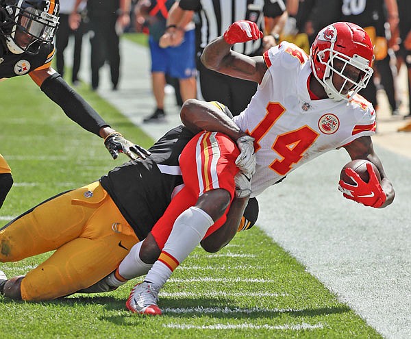 Chiefs wide receiver Sammy Watkins is tackled after making a catch against the Steelers during last Sunday's game in Pittsburgh.