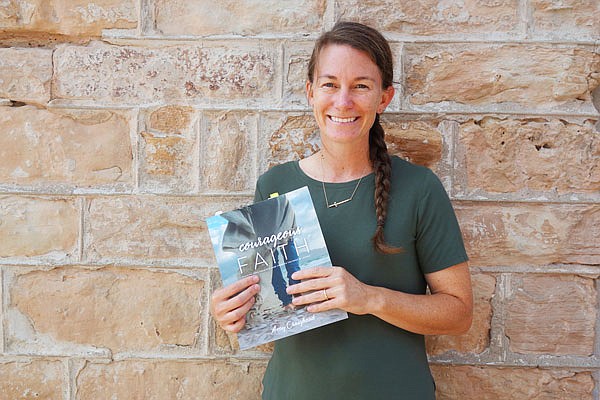 Fulton resident Amy Craighead's first book is a seven-week Bible study based on Joshua. Her sword necklace, crafted by her brother-in-law, reminds her to be a spiritual warrior.