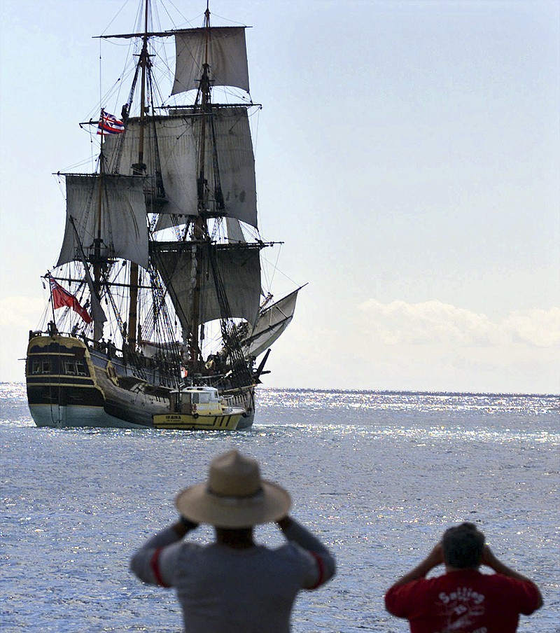 In this Nov. 15, 1999, file photo, people watch as a replica of the HMB Endeavour leaves Honolulu, as it embarked on a four-year, around-the-world cruise. The original vessel was commanded by Capt. James Cook in the 1700s when he became the first European to chart Australia's East Coast. Researchers said in September 2018 they've found a site where they think the ship that Cook used sank and may be located, and are planning an excavation off the coast of Rhode Island. (AP Photo/Ronen Zilberman, File)