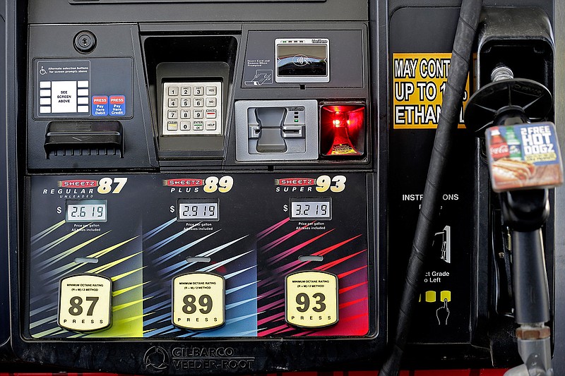 In this June 14, 2018, photo gasoline prices are displayed on a pump at Sheetz along the Interstate 85 and 40 corridor near Burlington, N.C.  America's rediscovered prowess in oil production is shaking up old notions about the impact of higher crude prices on the U.S. economy. (AP Photo/Gerry Broome)