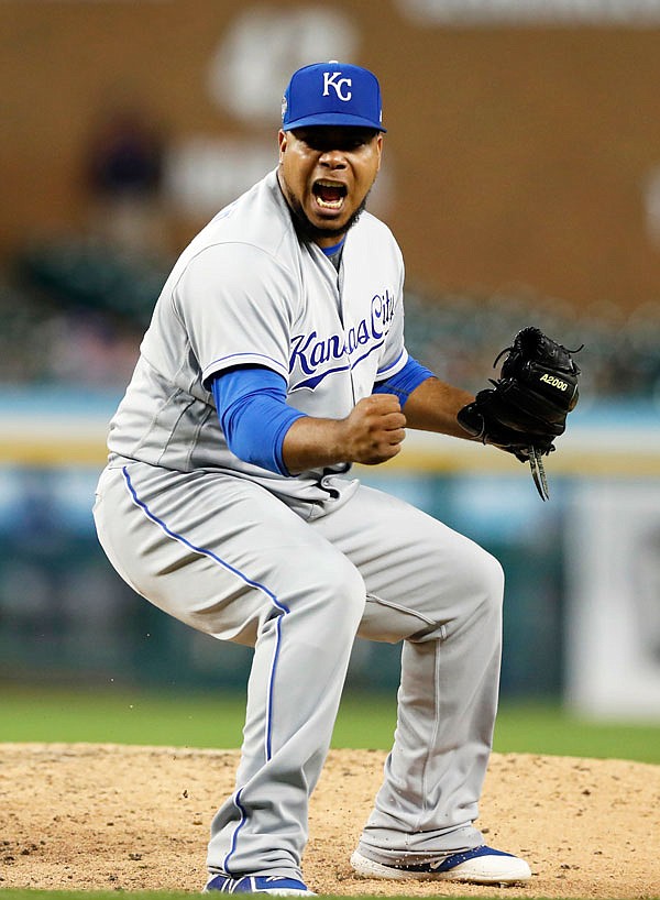 Royals relief pitcher Wily Peralta reacts after striking out Jim Adduci to earn a save and end Friday night's game in Detroit.