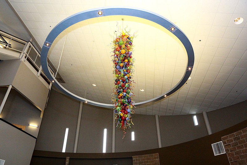 A huge art chandelier hangs in the rotunda of Hempstead Hall at the University of Arkansas at Hope in Hope, Ark. The handmade glass chandelier, titled "Visions of Harmony, Colors of Hope" was made by James Hayes, an artist from Pine Bluff, Ark.
