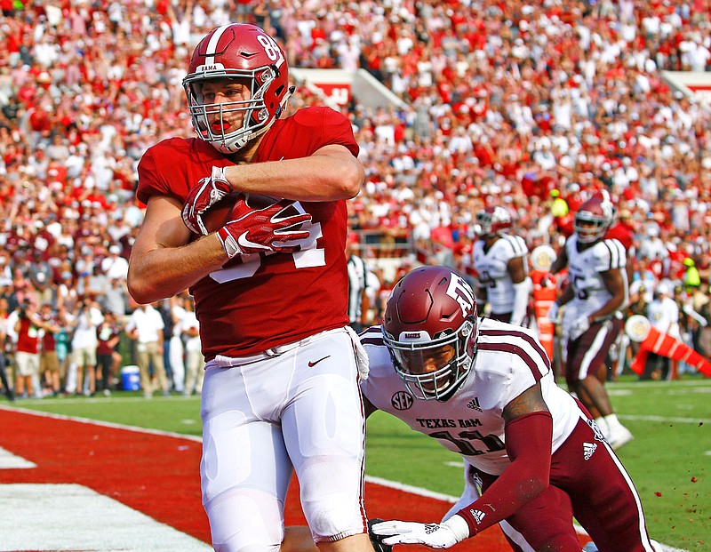 Alabama tight end Hale Hentges catches a touchdown pass against Texas A&M defensive back Larry Pryor during Saturday's game in Tuscaloosa, Ala. Hentges, a former Helias Crusader, caught two passes for 29 yards and two touchdowns.