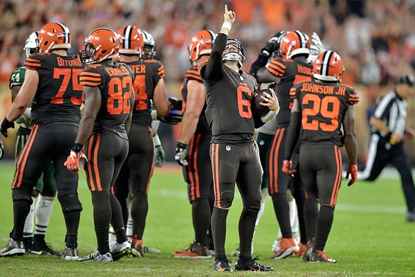 Browns quarterback Baker Mayfield celebrates after the final play of Thursday night's win against the Jets in Cleveland.