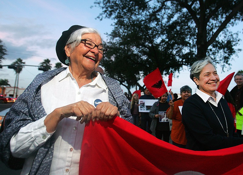 This photo taken Jan. 15, 2018, shows civil rights activist Rebecca Flores, left, and Sister Norma Pimentel marching down 17th street during the 8th annual MLK Day celebration  in McAllen, Texas.  (Joel Martinez/The Monitor via AP)