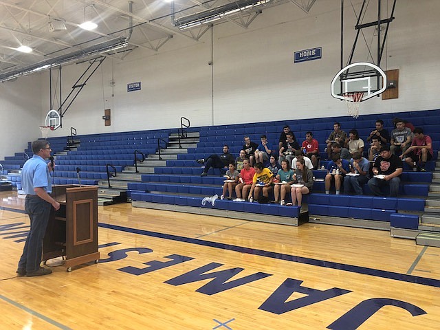 Steven Burger informs Jamestown juniors and seniors of the job opportunities at Burgers' Smokehouse near California, Mo.