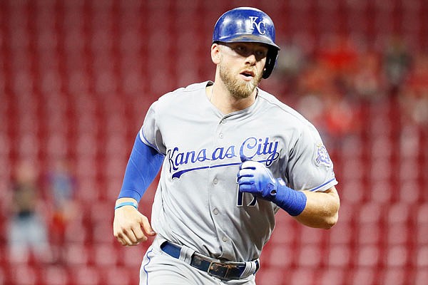 Hunter Dozier of the Royals runs the bases after hitting a go-ahead home run off Reds relief pitcher Raisel Iglesias in the ninth inning of Tuesday night's game in Cincinnati.
