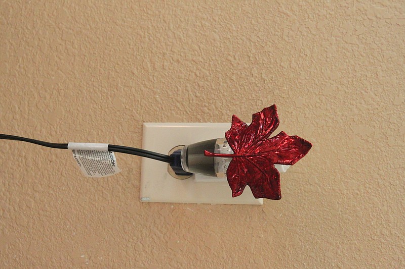 Outlet decorations may become a dangerous fire hazard if they are too close to the outlet.