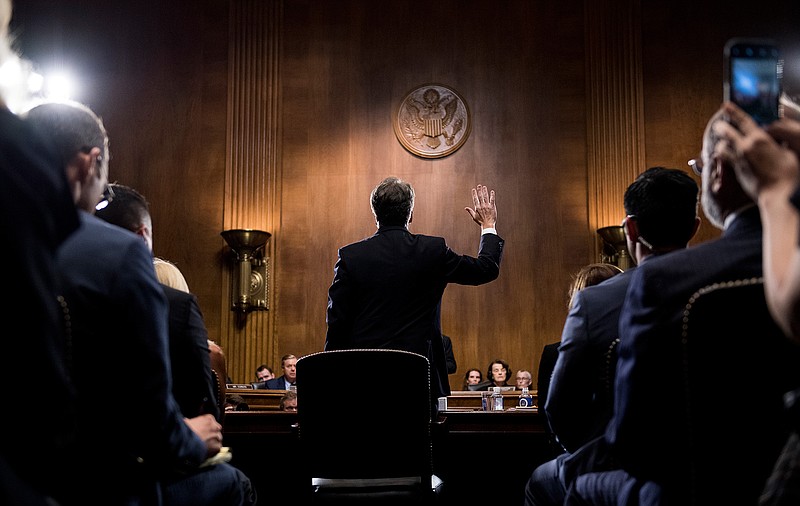 Supreme Court nominee Judge Brett Kavanaugh is sworn in before testifying during the Senate Judiciary Committee, Thursday, Sept. 27, 2018 on Capitol Hill in Washington. (Tom Williams/Pool Image via AP)