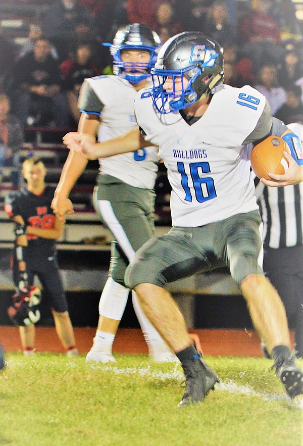 South Callaway sophomore running back Hayden Vaught carries the ball during the Bulldogs' 50-6 win last week at Bowling Green. South Callaway hosts Clopton/Elsberry tonight in Mokane.