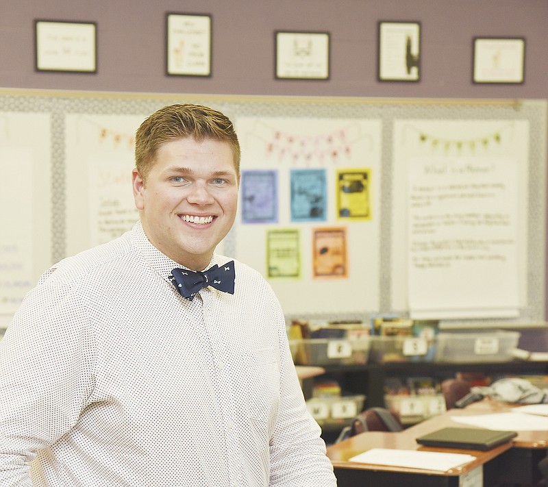 Dustin Jeffries poses in his Pioneer Trail Elementary School classroom. Jeffries received recognition as the 2018-19 Railton New Professional of the Year.