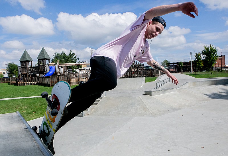 Christopher Skinner goes up the half pipe on his skateboard Monday at  Kidtopia Skate Park in Texarkana, Texas. The downtown skate park features many constructions that appeal to all skill levels.