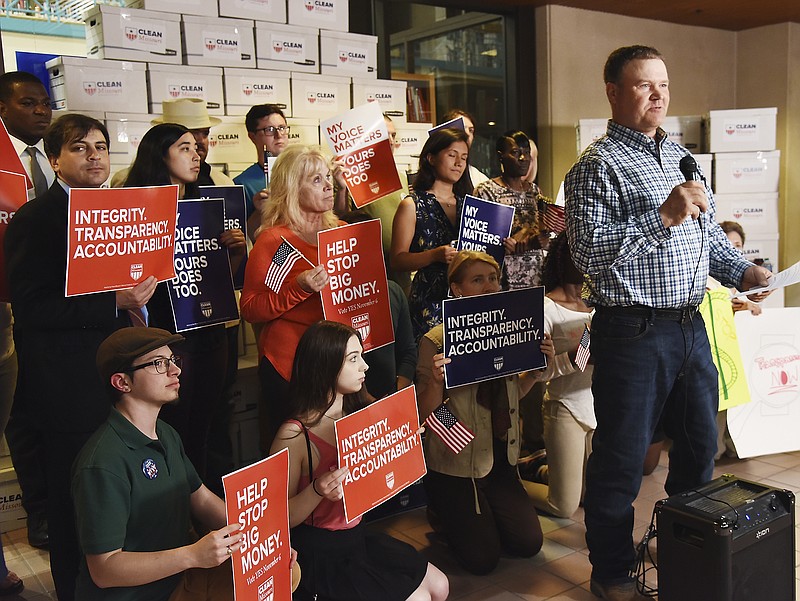 Julie Smith/News Tribune
Fourth-generation Callaway County farmer Jeff Jones addresses the media Thursday in the Missouri State Archives Building. He and other representatives of the Clean Missouri initiative presented the Secretary of State's office with over 344,000 signatures on petitions to increase integrity, transparency and accountability in state government. They hope to get the legislative reform amendment on the November ballot. 