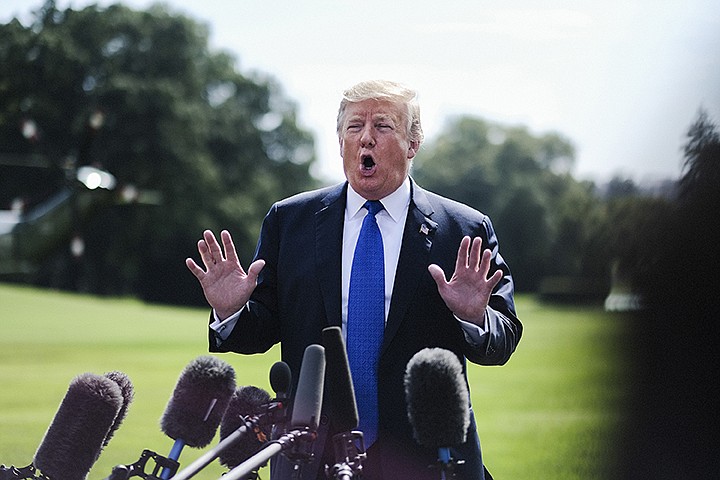 President Donald Trump speaks to the media before departing the White House on Marine One on Oct. 2, 2018, in Washington, D.C.  (Pete Marovich/Abaca press/TNS) 