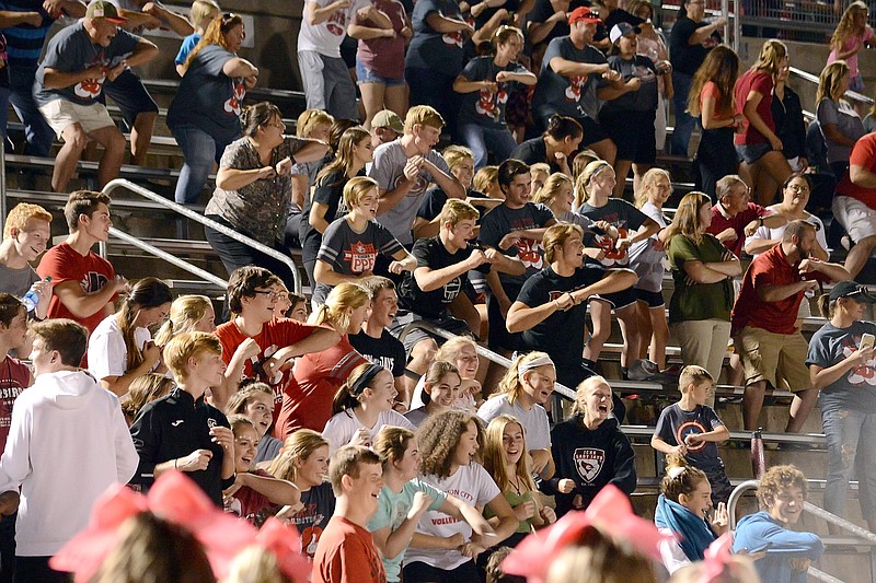 
Fans and students join in chant with Jefferson City High School's head football coach Terry Walker Wednesday October 3, 2018 during the senior pep rally at Adkins Football Stadium. 